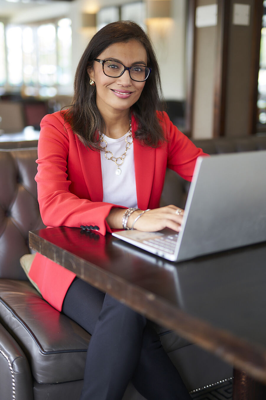 Devi Virdi working at a laptop